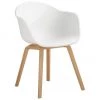 Westwing Collection Kunststoff-Armlehnstuhl Claire mit Holzbeinen, B 60 x T 54 cm